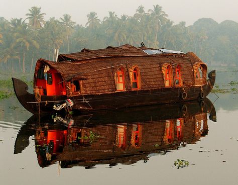 These houseboats ply the backwaters of Kerala. They were originally used as cargo boats until trucks took over. With the boom of tourism in the area recently, the number of these boats has skyrocketed.    This was taken at dawn near Allapuzha. Floating Homes, Gimme Shelter, House Boats, Bat Cave, Friend Vacation, Terra Nova, Unusual Homes, Tree Houses, Floating House