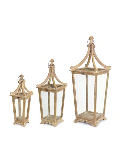 Description: Welcome your guests with this beautiful set of decorative lanterns. Its rustic yet traditional design paired with the classic wooden finish is the perfect combination to make a timeless and stunning piece. The lanterns are a great addition to both every day and seasonal home decor. The sturdy wood and metal composition is sure to last for seasons to come. Just add real wax or LED candles to complete the look. It also makes a great canvas for DIY faux floral arrangements.  Specification: Measures 12.25 x 12.25 x 39.75"; 9 x 9 x 29.5"; 7 x 7 x 20.5" Primary Materials: Wood, Glass Recommended for indoor use only Candles sold separately Candle holder; Rustic; Vintage; Natural; Floor; TaTapered Wooden Floor Lantern (Set Of 3) Brown    Wood     Home Decor, size features are:Bust: ,L Lantern Table Decor, Wood Lanterns, Floor Lantern, Decorative Lanterns, Glass Candle Lantern, Bleached Wood, Large Lanterns, Wood Lantern, Wooden Lanterns