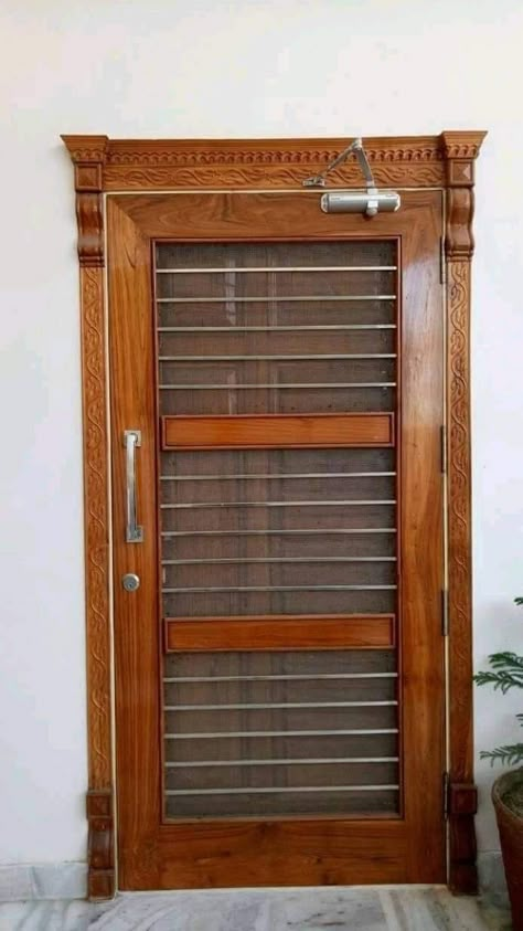 Wooden Door With Grill, Jali Gate Design Wooden Single Door, Door Cum Window Design, Mesh Doors Design For Main Door, Grill Door Design Front Entry, Net Door Design Wooden, Main Door Jali Design Entrance Modern, Jali Gate, Jali Door