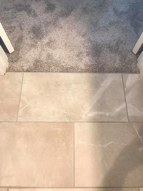 12x24 Tile to carpet transition in Master suite using Schluter profile. Carpet Tile Transition Ideas, Tile And Carpet Transition, Carpet To Tile Transition Ideas, Carpet Tile Transition, Tile To Carpet Transition, Entry Tiles, Circle Stairs, Trim Profiles, Carpet To Tile Transition