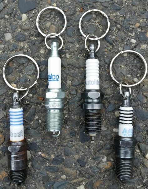 Spark plug keychains made by Traveled Past Car Part Art, Car Parts Decor, Car And Bike, Garage Furniture, Car Part Furniture, Automotive Furniture, Charming Home, Metal Working Projects, Automotive Decor