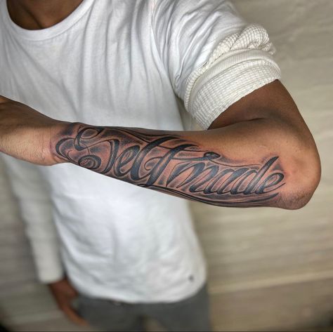 Inner Forearm Name Tattoo Men, Arm Tattoo Men Writing, Side Forearm Tattoos Men, Cursive Forearm Tattoo Men, Mom Name Tattoo For Men Forearm, Sidearm Tattoo Men, Blessed Tattoo For Men Forearm, Forearm Tattoo Writing, Cursive Forearm Tattoo