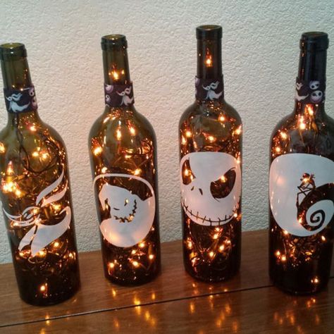 15 DIY Christmas Light Ideas to Make the Holidays Warmer and Brighter Wine Bottle Lights, Halloween Wine Bottles, Nightmare Before Christmas Wedding, Christmas Wine Bottle, Nightmare Before Christmas Decorations, Nightmare Before Christmas Halloween, Halloween Wine, Christmas Wine Bottles, Lighted Wine Bottles