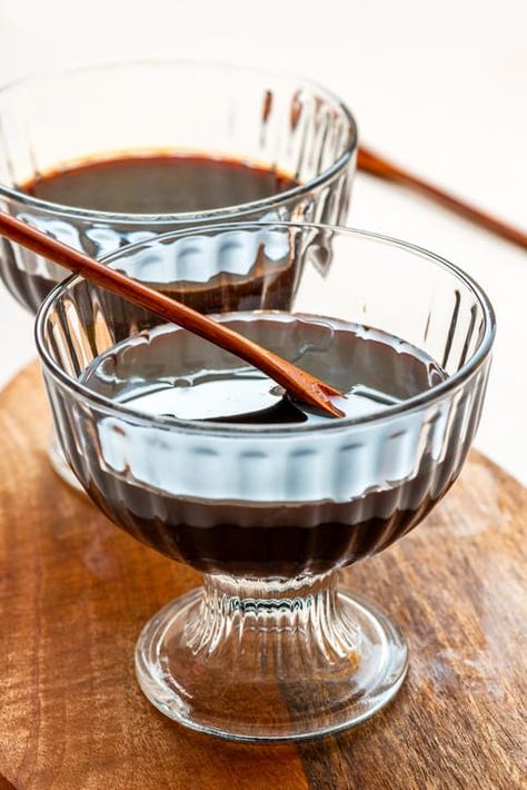 two glass bowls contain organic black cane molasses on a wooden table How To Make Molasses Homemade, Molasses Syrup, Homemade Molasses, How To Make Molasses, Molasses Recipes, Banana Bread Pudding, Sugarcane Juice, Blackstrap Molasses, Savory Dishes