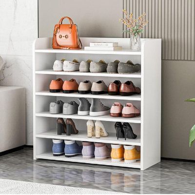 Large capacity foyer shoe cabinet under the foot of the love shoes have a home Finish: White | Captive Gala 18 Pair Shoe Rack Solid Wood in White, Size 37.4 H x 23.62 W x 11.81 D in | Wayfair | Organization Corner Shoe Rack Ideas Small Spaces, Shoe Rack Ideas Bedroom Small, Foyer Shoe Cabinet, White Wooden Shoe Rack, Shoe Rack Small, Shoe Rack Plans, Simple Shoe Rack, Shoe Rack For Home, Door Shoe Rack