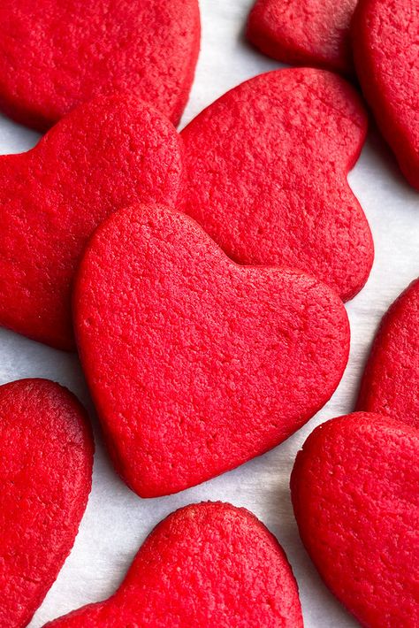 Easy heart cookies recipe, homemade with simple ingredients. Starts off with red velvet cake mix. These cut out sugar cookies hold their shape with no spreading. These are the perfect way to say 'I love you' this season! Make them for your family or let the kids decorate them or give them as gifts to family and friends. There is no wrong way to share the love! These Valentine's Day Cookies {Love Letter Cookies} and Easy Love Cake are two other fun ideas. If you are still stuck on ideas, be ... Cake Mix Cutout Cookies, Red Velvet Sugar Cookies, Red Velvet Valentine Cookies, Easy Heart Shaped Cookies, Red Velvet Cut Out Cookies, Valentine Cutout Cookies, Red Velvet Heart Cookies, Cake Mix Valentine Cookies, Heart Shaped Red Velvet Cookies