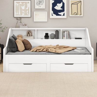 √ This amazing daybed is a true space-saver! With its unique same-height pull-out trundle the bed extends from a twin-size to a king-size day bed. The bed also includes two large storage drawers and 3 built-in bookcases in the headboard that can store your daily necessities. You will enjoy the versatility of this bed for years to come! Enjoy modern convenience with the built-in charging station, featuring three USB ports. This thoughtful design allows for easy charging of mobile phones and other