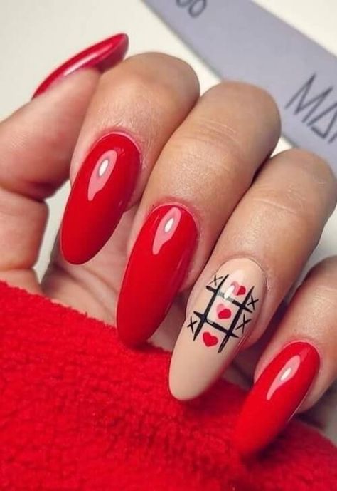 Looking for cute and romantic red Valentines Day nails ideas? Check this post for the 70+ trendy red Valentine's Day nail design ideas that you'll love! From short simple nails to long stunning nails, we've got you covered! Love Themed Nails, Birthday And Valentines Nails, Love Hate Nails, Red And Black Valentine Nails, Valentines Day Nails Matte, Disney Valentines Nails, Black And Red Valentines Nails, Red Nails Valentines Day, Red Valentines Day Nails Acrylic