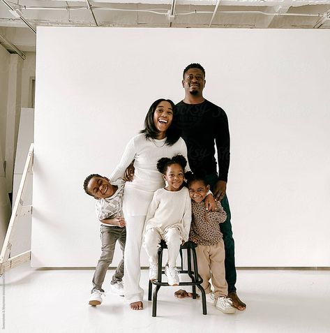 "Family Portrait In Studio" by Stocksy Contributor "Sweenshots & Shaymone" - Stocksy Portrait In Studio, Casual Family Photos, Casual Neutral Outfits, Studio Family Portraits, Heirloom Portraits, Family Photoshoot Poses, Family Portrait Poses, Studio Poses, Studio Photography Poses