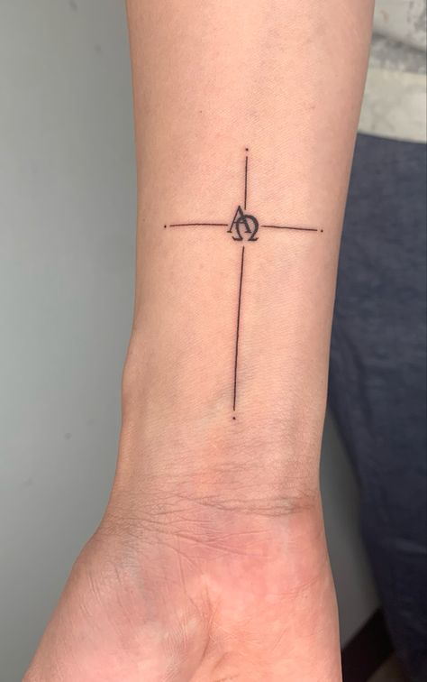 Alpha omega tattoo 
Forearm tattoo
Cross tattoo
Christian symbol tattoo Cross Compass Tattoo, Cross Patchwork Tattoo, Forearm Tattoo Women Cross, Forarm Tattoos Cross, Small Faith Tattoo, Alpha And Omega Tattoo, Simple Cross Wrist Tattoo, Coptic Cross Tattoo, Crucifix Drawing