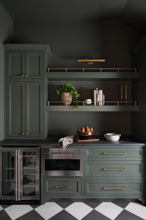 Beyond the kitchen hustle, the butler's pantry stands ready—organized elegance for the modern host. Dark Green Butlers Pantry, Moody Butlers Pantry, Black Cabinets Butlers Pantry, Jean Stoffer Butlers Pantry, Teal Butlers Pantry, Dark Pantry, Kitchen With Butlers Pantry, Dark Green Kitchen, Kitchen Ornaments