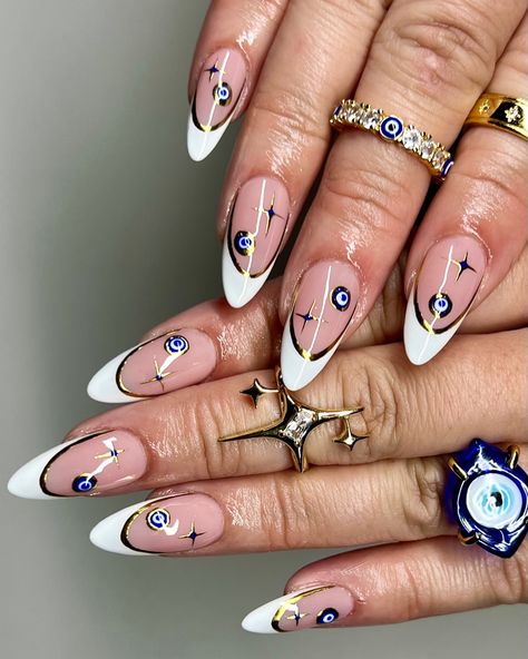 ✨🧿 . Inspo from Pinterest! . @nailzkatkat Use code “PBP10” for $$ off! Delicate White French tips Mal de Ojo . . #nails #nailart #nailinspo #naildesign #handdrawn #miami #miamigardens #miamilakes #hialeah #wynwood #doral #miramar #pembroke #nailtech #nailartist #gelx #gelextensions #apres #naturalnails #overlay #structuredmani #watchmework #beforeandafter #nailsofinstagram #gold #chrome #maldeojo Ojo Nails, White French Tips, Miami Gardens, White French Tip, Gel Extensions, White French, Gold Chrome, French Tips, Nails Nailart