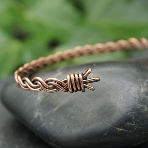 This gorgeous copper bangle has been completely handmade from copper wire. I've formed a twisted pattern using four lengths of wire - simple but very effective! The ends have been finished with a band of wrapped wire & three small loops, meaning it's comfortable to put on & wear. The finished bracelet has been lightly hammered to strengthen it & then shaped. It's a very delicate looking design that would be perfect for everyday wear.  I have oxidised the copper & then polished it, really bringin Folksy Christmas, Handmade Copper Bracelet, Copper Jewellery, Copper Jewelry Handmade, Copper Wire Jewelry, Wire Jewelry Designs, Wire Wrapped Bracelet, Copper Cuff, Diy Wire Jewelry