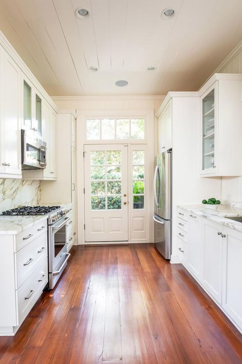 Dreamy White Kitchen Beautiful Front Porches, House Plans With Porches, White Galley Kitchens, White Galley Kitchen, Galley Kitchen Renovation, Small Galley Kitchen, Airy Bedroom, Porch House Plans, Galley Kitchens