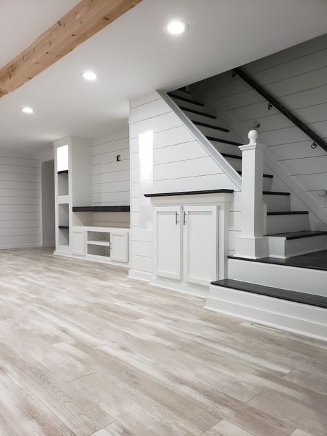 Cottage Style Basement, Open Concept Finished Basement, Modern Farmhouse Basement Family Room, Finished Walkout Basement Ideas, Basement White Walls, Coastal Basement Ideas, Nice Basements, Modern Basement Design Ideas, Narrow Basement Layout