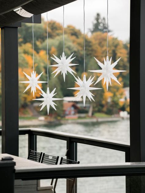 40 Outdoor Christmas Lights Ideas | HGTV Snowflake Outdoor Lights, Christmas Light Alternatives Outdoor, Christmas Lights Farmhouse, Christmas Shed, Wreaths For Windows, Christmas Lights House, Best Outdoor Christmas Decorations, Christmas Wreaths For Windows, Water Lights