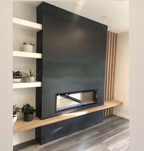 Black Steel Fireplace Wall, Modern Black Fireplace With Built Ins, Modern Fireplace Black Marble, Fireplace Tv Wall Minimalist, Entry Alcove Ideas Foyers, Modern Area Rugs Living Room, Linear Fireplace With Floating Hearth, 72 Inch Tv On Wall, Modern Built In Fireplace And Tv