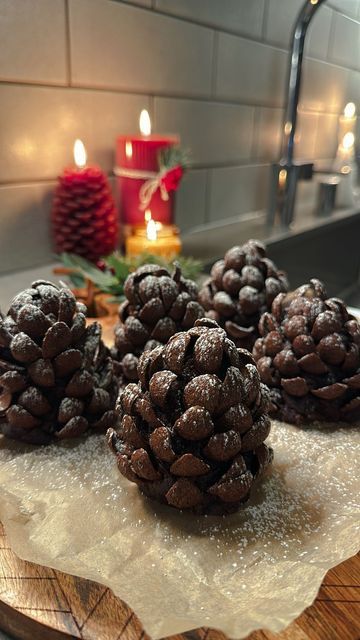 @nourishbydanelle on Instagram: "Pine Cone Brownies ⬇️🎄🍫 Recipe 🧚 Ingredients: One box of your favorite brownie mix Powdered Sugar Chocolate cereal Method: cook brownies and let cool. Crumble brownies with hands until your it’s well combined and have a cake pop like texture. Use an ice cream scoop (2 scoops) and make pine cone shape. Add cereal and top off with powdered sugar. Note: to elevate brownie mix use melted butter instead of oil. Also, instead of water use milk. Any milk will do I always have vanilla almond milk at home so that’s what I used. The cereal I used is called Chocapic and I found it on Amazon. But you can use what you think works best. Last make sure you don’t overcook your brownies, mine were slightly undercooked ❤️ . . . . #brownies #christmasdessert #cookingvid Brownie Pine Cones With Almonds, Pine Cone Brownies With Almonds, Pine Cone Cake Pops, Pine Cone Brownies, Pinecone Brownies, Almond Milk At Home, Found It On Amazon, Chocolate Cereal, Chocolate Cake Pops