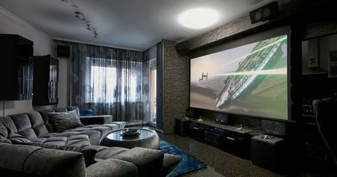 Projectors vs. TVs: Which big screen should rule your home theater? #hometheatreprojectors Home Theater Screens, Basement Home Theater, Home Theater Furniture, Home Cinema Room, Best Home Theater, Home Theater Setup, Home Theater Speakers, Home Theater Projectors, Home Theater Rooms