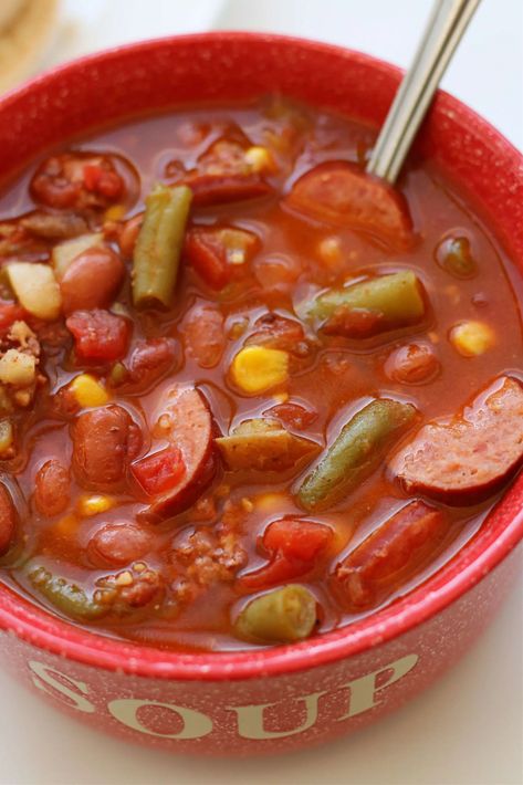 Instant Pot Texas Cowboy Soup--an easy soup with hamburger, smoked sausage, corn, beans, potatoes and more! This soup has lots of flavor and will fill up your little cowgirls and cowboys! Texas Cowboy Soup, Soup With Hamburger, Cowboy Soup, Cowboy Stew, Beans Potatoes, Texas Cowboy, Lean And Green Meals, Sausage Soup, Best Instant Pot Recipe