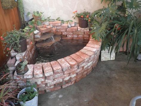 Antique Brick Project Ideas | Brick DIY Projects Patio Ponds, Driveway Border, Brick Planter, Deck Cleaning, Fish Pond Gardens, Brick Projects, Brick Works, Brick Fire Pit, Antique Brick