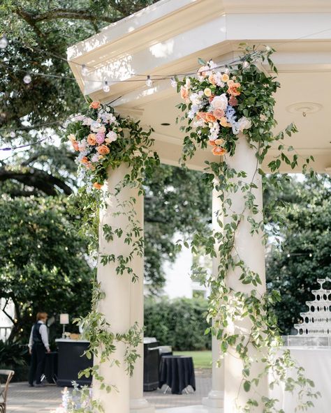 At Doris Ione Weddings, we find beauty in the continuity of love. Witness the seamless transition from ceremony to reception as our floral backdrop takes center stage again, this time as a dazzling champagne pyramid. Your love story, told through the artistry of flowers. Column Decor, Outdoor Wedding Flowers, Greenery Decor, Flower Party, Wedding Ceremony Flowers, Floral Backdrop, Venue Decor, Ceremony Flowers, Intimate Weddings