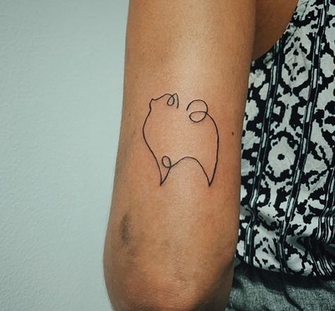 14 Amazing Pomeranian Tattoo Ideas For Every Taste | Page 2 of 3 | PetPress Dog Tattoos Pomeranian, Pomeranian Tattoo Ideas, Pom Dog Tattoo, Pomeranian Ear Outline, Small Pomeranian Tattoo, Dog Line Art Tattoo Pomeranian, Pomeranian Silhouette Tattoo, Pomeranian Ears Tattoo, Pomeranian Tattoo Minimalist