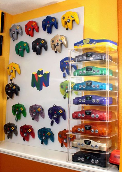 colorful-video-game-controller-storage-ideas Gamer Room Diy, Video Game Storage, Video Game Controllers, Video Game Collection, Game Storage, Video Game Rooms, Game Controllers, Video Game Controller, Gamer Room