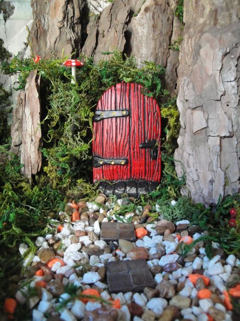 "Please see below and choose from the two packages offered. The Leddiq Door shown in Deep Cardinal Red and distressed in black with grey/black aged little steps.  Dimensions are 3.25\" Long x 2.25\" Wide.  Strong hook for hanging. 🍃 🍄 Perfect fairy door accessory kit for any garden large or small. Small trees are perfect to place these little doors approximately 1-2 feet across. All of my items are weatherproof with added waterproofing and UV protection.  The Leddiq door is a very special, mag Outdoor Fairy Garden, Fairy Door Accessories, Fairy Doors On Trees, Door Tree, Earth Fairy, Red Fairy, Fairy Garden Kit, Fairy Garden Crafts, Small Flower Pots