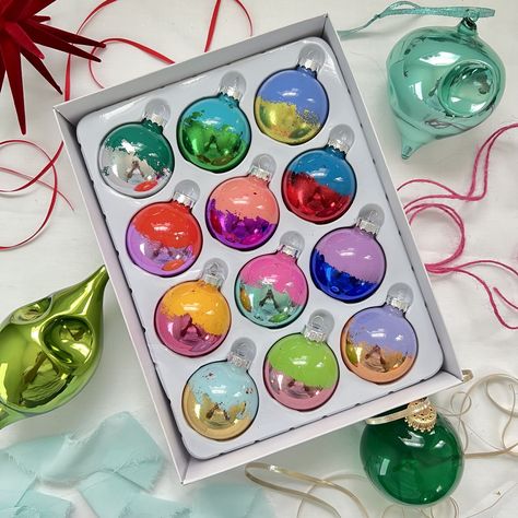 Add some color and fun to your Christmas tree this year! This SET OF 12 ornaments includes 12 multi-colored ornaments with metallic leaf accents. 2 inch glass ornaments with silver hanging caps. Colors and metallic leaf combinations will vary. No two sets are alike! To ensure maximum shine and *wow* factor, these ornaments have not been coated with a protective sealant. Please handle with care and store in a cool, dry place. Please message me for custom color combinations! Colorful Christmas Ornaments, Rainbow Christmas Tree, Boho Christmas Decor, Metallic Christmas, Rainbows Christmas, Leaf Ornament, New Year's Eve Celebrations, Glass Balls, Rainbow Decorations