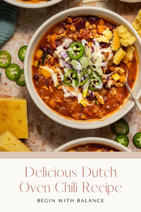 This delicious dutch oven chili is easy to make and perfect for cozy fall weather. It's also packed with protein, fiber, and veggies to make a nutritious dinner. Serve it with cornbread to make the perfect autumn meal! Chilli Dutch Oven, High Protein Dutch Oven Recipes, Chili Recipe Dutch Oven One Pot, Dutch Oven Chilli Recipes, Fall Dutch Oven Recipes, Chili Recipe Dutch Oven, Dutch Oven Soups, Dutch Oven Meals, Healthy Dutch Oven Recipes