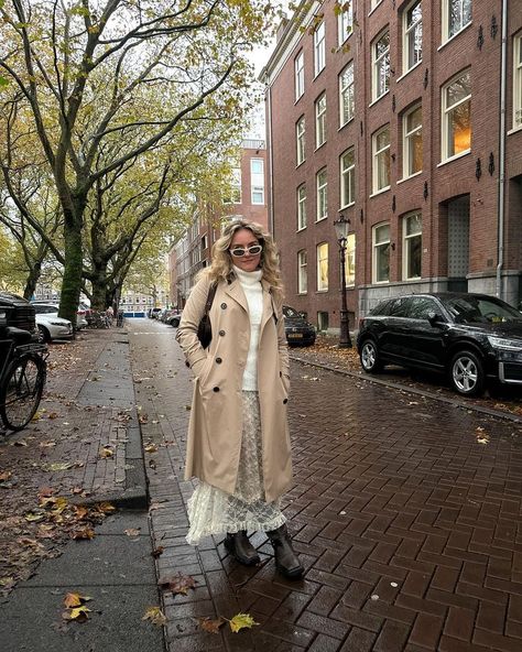 Girl in cream white lace maxi skirt, chunky sweater, trenchcoat, oval brown bag, and biker boots, walking in the fall streets of Amsterdam. Biker Boot Outfit, Biker Boots Outfit, White Lace Maxi Skirt, Style Midsize, Midsize Outfit, Lace Maxi Skirt, Fall Outfit Inspiration, Casual Fall Outfit, Midsize Outfits