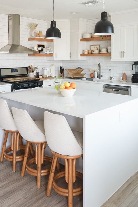 This bright and airy design features a stunning waterfall kitchen island with Everest Quartz. Tap the photo to learn more. Jessica Bui | @the.orange.home on Instagram #whitekitchen #whitequartz #quartzcountertop #waterfallcountertop #ArizonaTile Square Island Kitchen, Kitchen Layout U Shaped, Waterfall Island Kitchen, Organic Modern Decor Living Room, Waterfall Countertop, Modern Kitchen Design Open Concept, Modern Kitchen Design Luxury, Organic Modern Decor, Quartz Kitchen Countertops