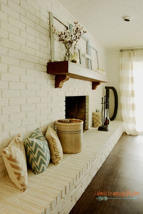 1970s Living Room Makeover | See the transformation of this fun space in a quirky 1970 fixer upper. 1970 House Remodel, 1970s Living Room, Quirky Living Room, Brick Wall Living Room, Brick Fireplace Wall, White Brick Fireplace, Brick Fireplace Makeover, Fireplace Remodel, Fireplace Makeover