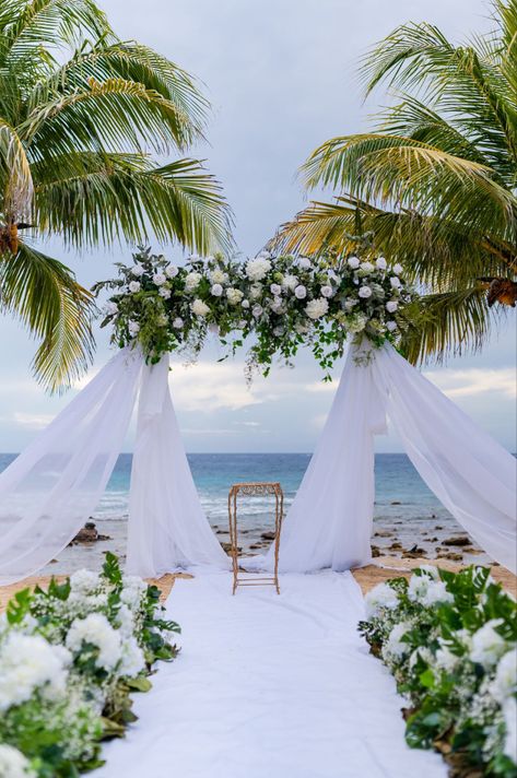 Wedding arch at the beach #wedding #destinationwedding #weddingtip #bridetip #cruisewedding #beachwedding #eventplanner #weddingplanner #weddingdress #marryinroatan #roatan #honduras #beach #destinationweddingtips #weddingdetail #weddingday #weddingvenue #weddingceremony #beachweddingideas #bridalflowers #sunsetwedding #weddingdress #weddingdecor #weddingideas #weddingphotography #modernwedding #luxurywedding Wedding Arch Ideas Beach, Beach Wedding Photobooth, Elegant Beach Wedding Ceremony, Beach Wedding Arch Ideas, Wedding Environment, Green Beach Wedding, Honduras Beach, Beach Wedding Ceremony Arch, Beach Wedding Setup