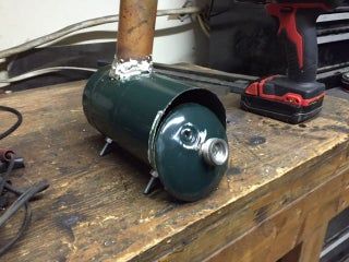 Propane Tank Wood Stove for $5 : 5 Steps (with Pictures) - Instructables Propane Tank Wood Stove Diy, Garage Wood Stove, Diy Mini Wood Stove, Diy Wood Stove How To Build, Propane Tank Ideas, Propane Tank Wood Stove, Gas Bottle Wood Burner, Wood Stove Installation, Diy Stove