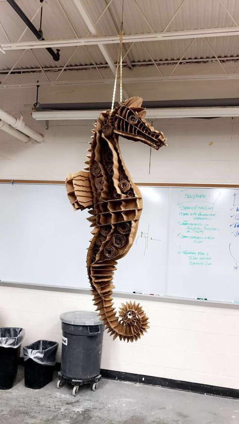 A seahorse I made out of cardboard Cardboard Seahorse, Cardboard Creatures, Cardboard Ocean Animals, Cardboard Sculptures, 3d Cardboard Animals, Cardboard Sculpture Ideas, Cardboard Alligator, Cardboard Sea Creatures, Paper Mache Seahorse