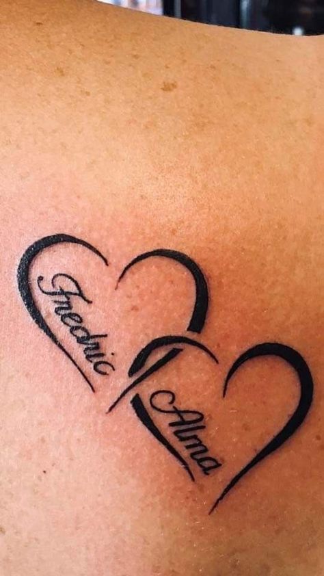 Family Tattoos With Names, Grand Kids Tattoo Ideas, Hearts With Names Tattoos, 2 Heart Tattoo Designs, Heart Tattoo Designs With Names, Tattoo Of Kids Names For Women, Two Kids Tattoo Ideas, Grandson Tattoos For Grandma, Children Name Tattoo Ideas For Women