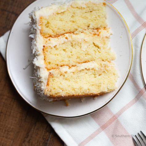 I love a good slice of coconut cake.  Save this recipe to make an old fashioned 3 layer coconut cake.   #layercake #coconutcakes #bakingrecipes 3 Layer Coconut Cake Recipe, Old Fashioned Coconut Cake, Southern Coconut Cake Recipe, Coconut Layer Cake, Southern Cakes, Moist Yellow Cakes, Coconut Buttercream, Coconut Icing, Southern Cake