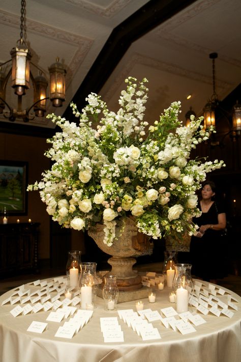 A classic garden arrangement in an urn Big Floral Arrangements Wedding, Big Flower Centerpieces, Urn Centerpiece, Peony Floral Arrangements Wedding, Indoor Wedding Floral Decoration, Wedding Colors Classy, Garden Party Wedding Centerpieces, Floral Wedding Arrangements, High Floral Centerpieces Wedding