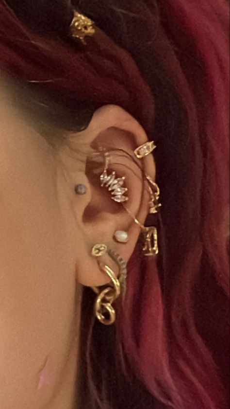 stacked ear , curated ear, jewelry, gold jewelry, earrings, gold huggie hoops #stacked #curatedear #fashion #aesthetic #thesummeriturnedpretty #goldjewellery #gold #hoopsnmore #goldhoopearrings Gold Ear Jewelry Aesthetic, Masc Earring, Gold Face Piercings, Gold Curated Ear, Ear Setup, Gold Earring Stack, Aesthetic Piercings, Full Ear Piercings, Ear Stacks