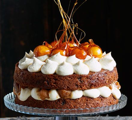 Toffee apple cake: This showstopping bake is a celebration of classic apple desserts with spiced sponge, vanilla icing and a sticky caramel apple filling Caramel Apple Filling, Toffee Cake, Toffee Apple, Vanilla Icing, Sandwich Cake, Cooked Apples, Apple Filling, Chocolate Icing, Chocolate Cinnamon