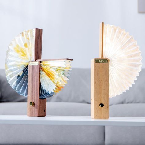 Yanko Design on Instagram: “This accordion-inspired ambient light has the elegance of a decorative Origami folding fan! - The OMLAMP’s folding illuminated ‘wings’ open…” Evolution Of Money, Medical Product Design, Origami Lampshade, Boutique Furniture, 3d Print Design, Light Fan, Paper Fan, Paper Lampshade, Origami Folding