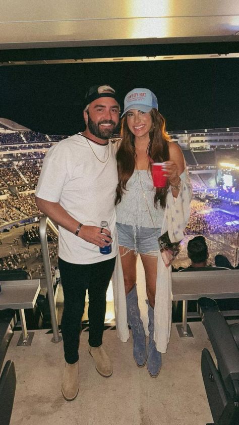 We wore these couples country concert outfit to the Luke Combs concert & they were so perfect!  Save these country concert outfit ideas & get Bryce's country concert outfit mens & my jean shorts & cowboy boots outfit here! Couples Country Concert, Stagecoach Outfit Boho, Outfit With Boots Country, Concert Outfit With Boots, Country Concert Outfit Black, Country Concert Pictures, Country Concert Couple, Concert Outfit Outdoor, Concert Outfit Summer Country