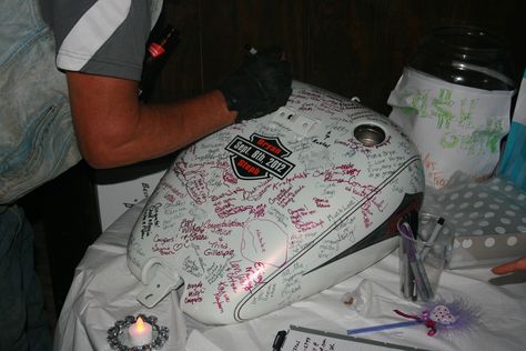 This Harley Davidson tank is what we used for our Guest to sign instead of a book..We love how it turned out and we will have it to look at instead of put away in a drawer or box. :) Biker Wedding Theme, Grooms Table, Bike Wedding, Harley Davidson Wedding, Motorcycle Wedding, Wedding Guest Table, Biker Wedding, Art Nouveau Weddings, Wedding Renewal Vows