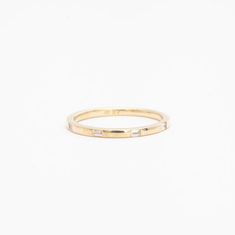 Saying "yes" is forever and Jennie Kwon honors that with her distinctive take on the eternity band. Evenly spaced baguette diamonds are flush-set into this gold ring, punctuating its polished surface with shimmering windows of light. Add it to your favorite stack of rings to bring variety in color and texture to your e Baguette Wedding Band, Flush Set Diamond, Modern Wedding Band, Jennie Kwon, Saying Yes, Gold Diamond Band, Baguette Ring, Baguette Diamonds, 21st Gifts