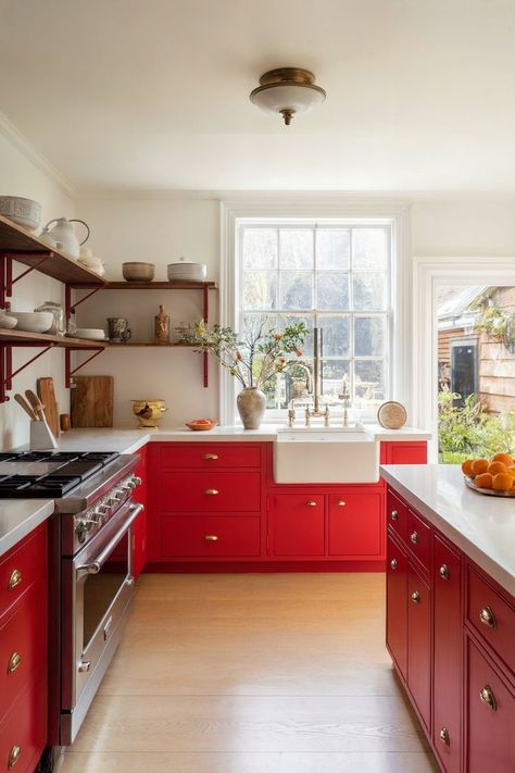 Red kitchen cabinets create a bold, vibrant look in a traditional kitchen with wooden shelves and accents. Best Kitchen Cabinet Colors, Kitchen Cabinets Colors, Red Kitchen Cabinets, Beige Kitchen Cabinets, Yellow Kitchen Cabinets, Cabinet Color Ideas, Painted Kitchen Cabinets, Cabinets Colors, Kitchen Cabinet Color