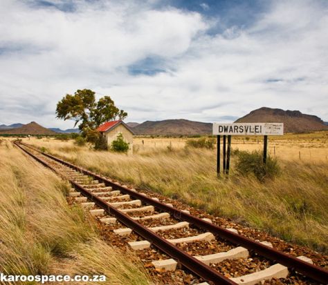 Railroad through the Karoo landscape Karoo Landscape, South African Railways, Africa Do Sul, Out Of Africa, Southern Africa, Train Tracks, Africa Travel, South African, Beautiful Landscapes