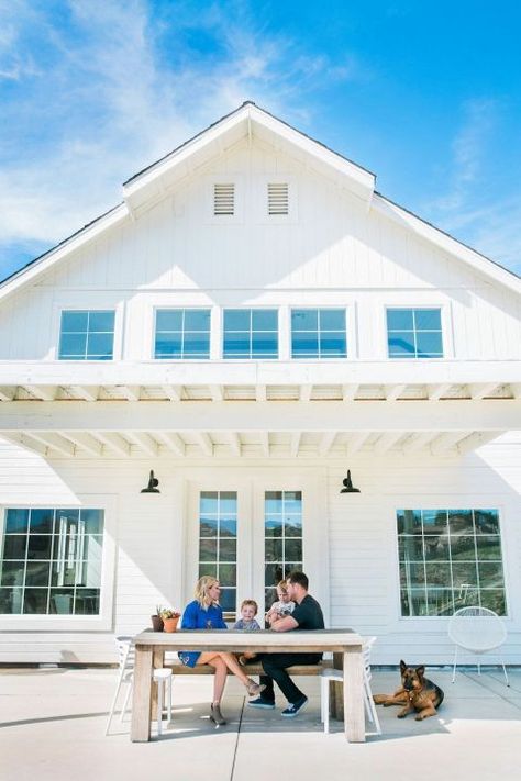 The breathtaking white barn with its many windows and clean siding is now an architectural masterpiece. Converted Barn Homes, Barn House Conversion, Barn Living, Beach House Exterior, Barn Renovation, Converted Barn, A Beautiful Mess, Barn Conversion, White Barn