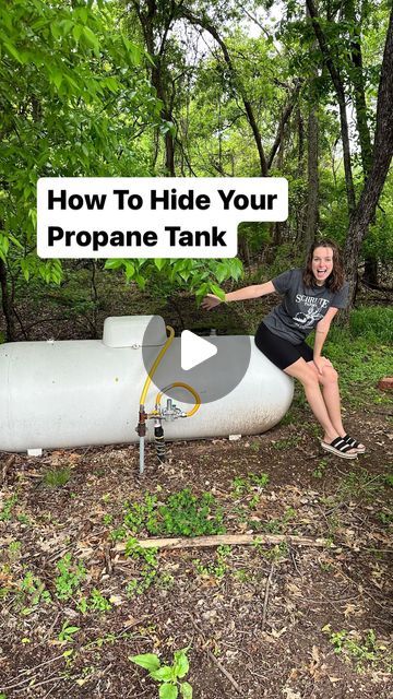 maggie mcgaugh on Instagram: "Propane tank gets camouflaged! 😏  If it weren’t for @ferrellgas , I’d still be stuck on hold trying to reach someone who services my area. 😂  #ad Ferrellgas made my life easier, and with my saved time and a little hard work, I got this beautiful view.   Click the link in my bio to get a propane price quote from Ferrellgas.   #FuelLifeSimply #Ferrellgas #propanetankmakeover #frontyardmakecover #yardmakeover" Covering Propane Tank Ideas, Hiding Propane Tank, Propane Tank Art Ideas, Hide Propane Tank Ideas, Propane Tank Hide, Propane Tank Landscaping Ideas, Painted Propane Tanks Ideas, Hidden Propane Tank Ideas, Hide A Propane Tank